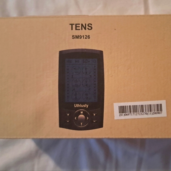 TENS UNIT IN BOX - Picture 1 of 5